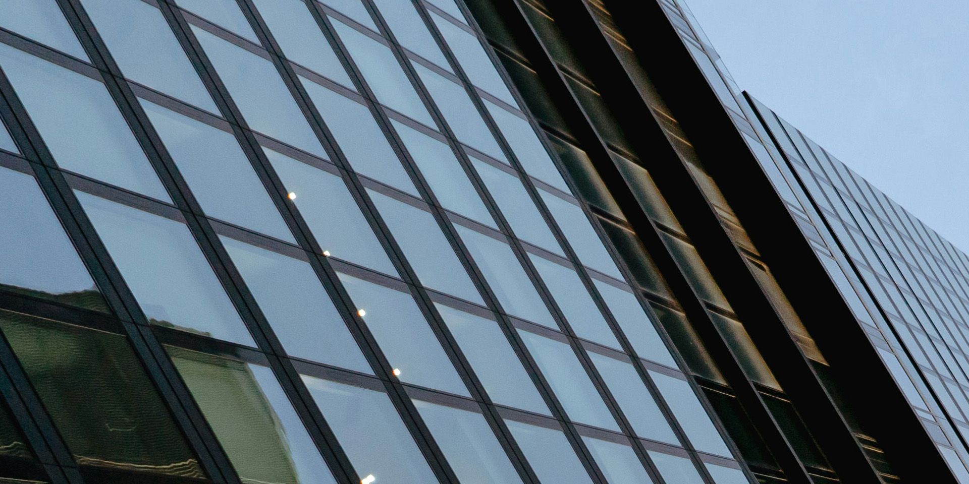 Corporate Building Glass Facade for How to Use a Corporate Finance Simulation to Explain Capital Budgeting to Students