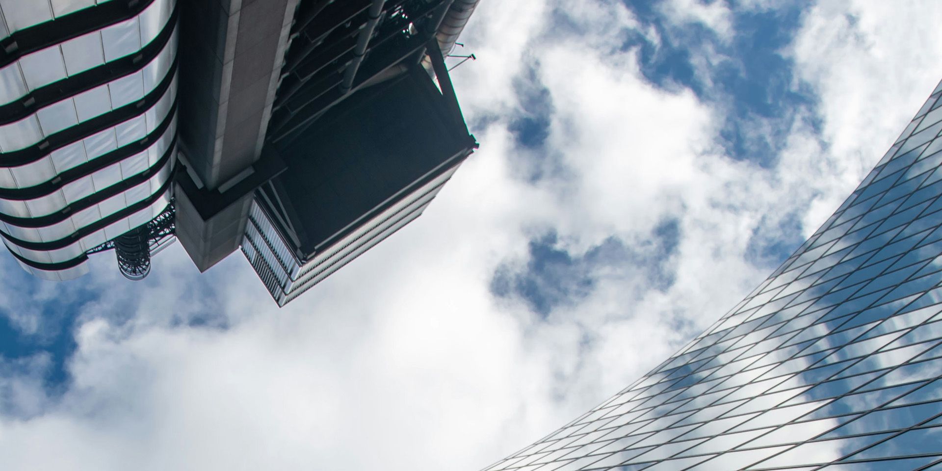 Modern Skyscrapers Against Cloudy Sky for The Hidden Investment Banking Trends Reshaping Markets in 2025