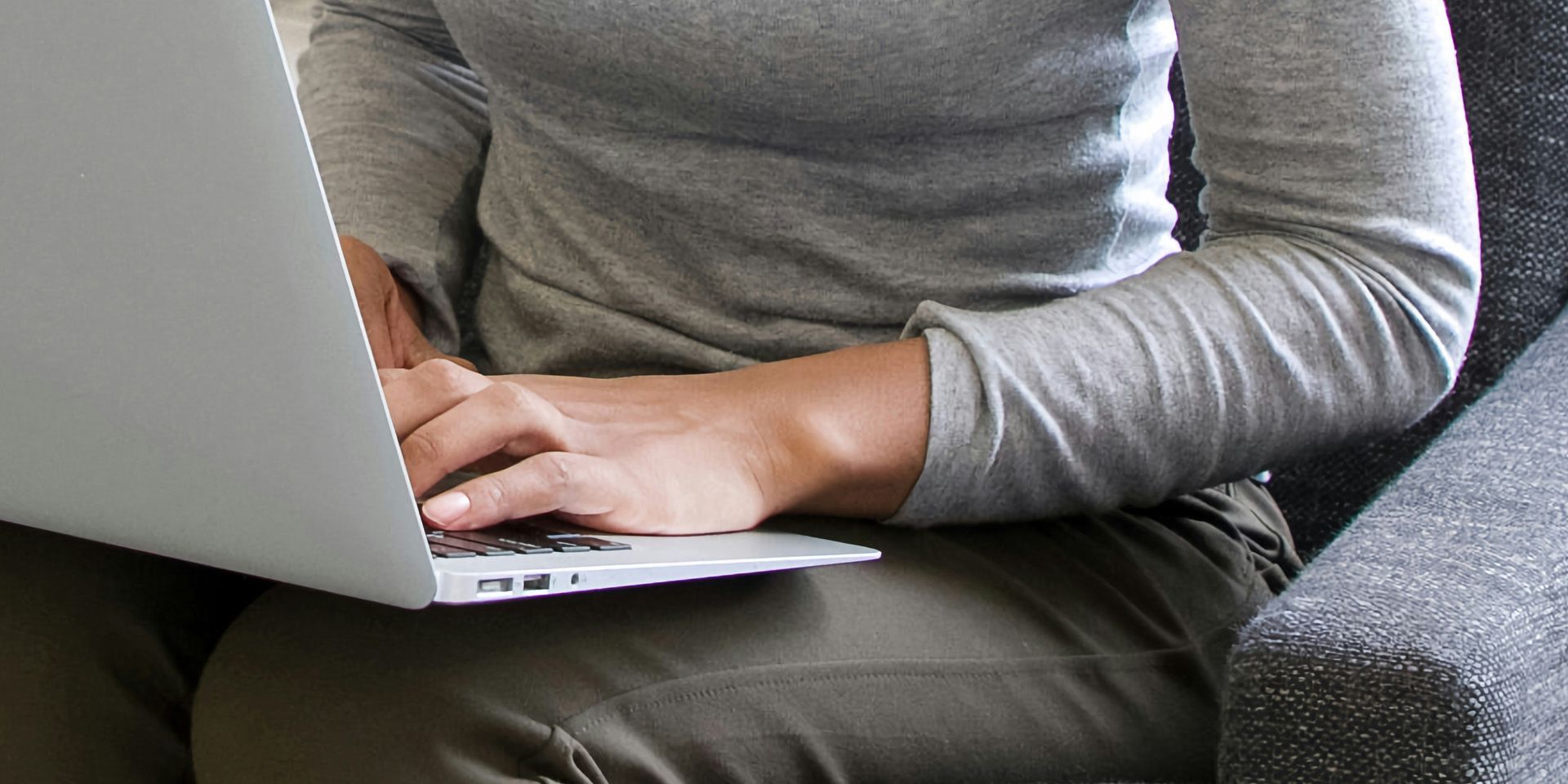 Person Working on Laptop at Home for Begin Your Career in Asset Management: Roles, Skills, and Growth Paths