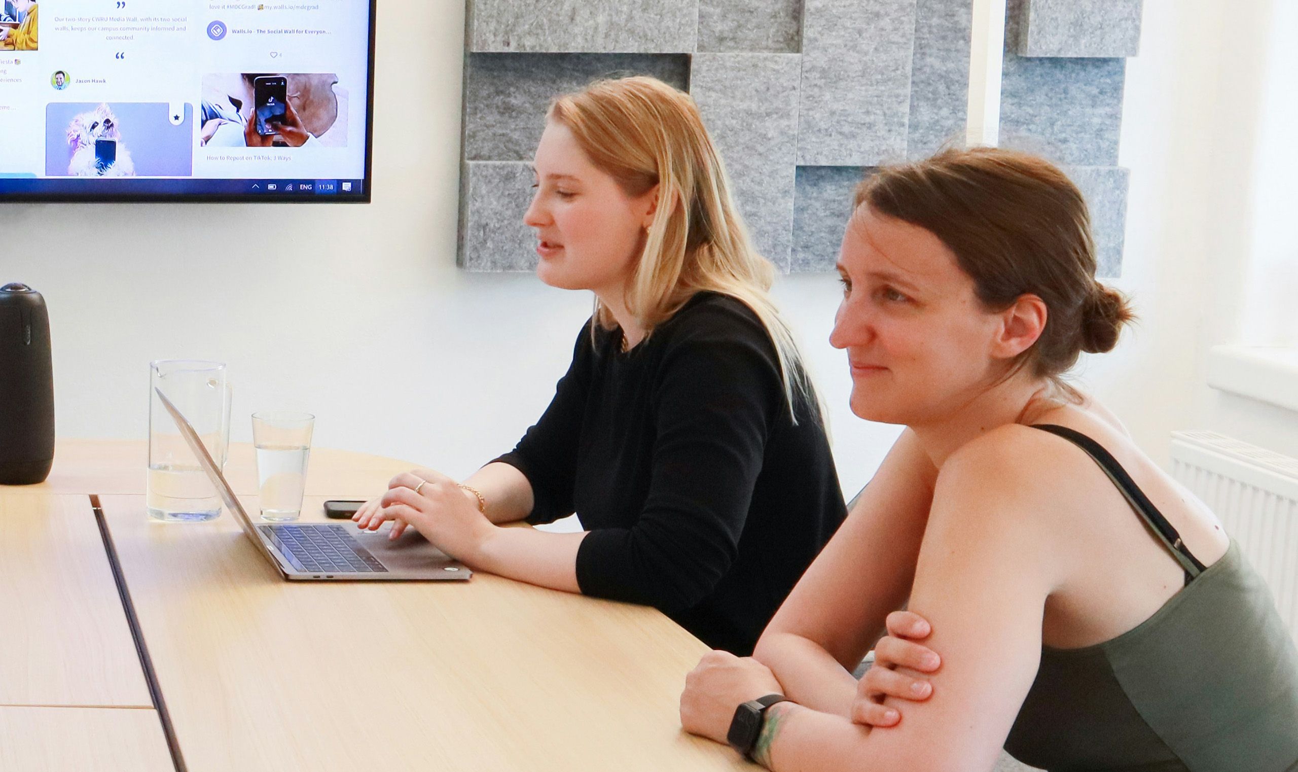 Two Women Collaborating in Modern Office for How to Gain Practical Finance Experience: Boost Your Skills with Simulations