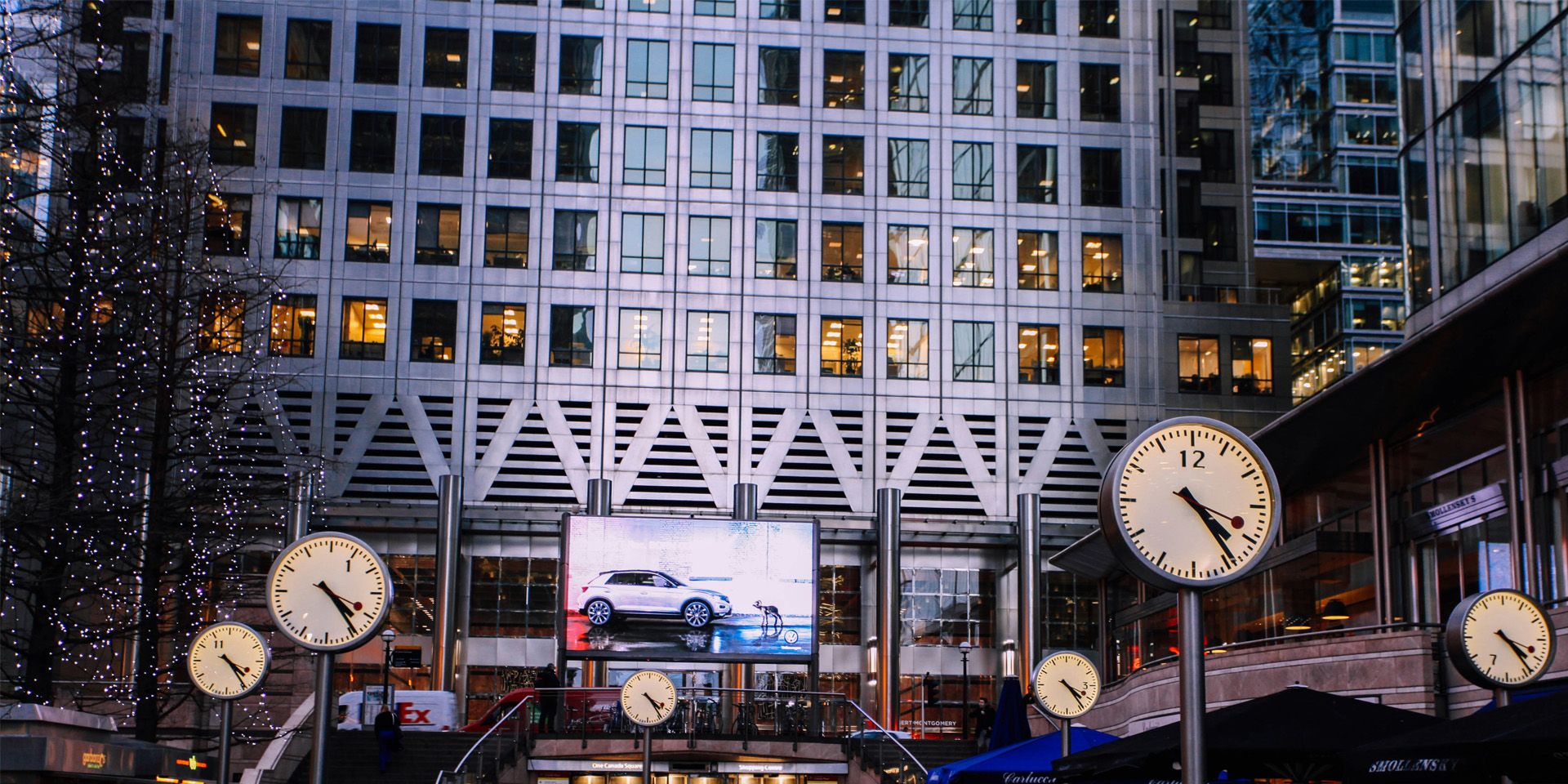 Urban Financial District with Clocks for A Day in the Life of an Investment Banking Analyst